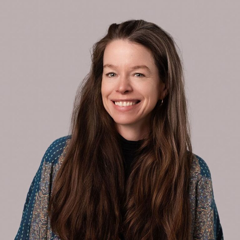 Edmonton Healing Centre professional therapist smiling in office.