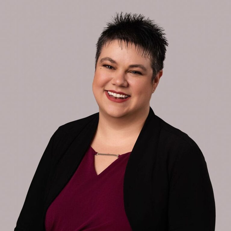 Edmonton Healing Centre professional portrait of a smiling woman.