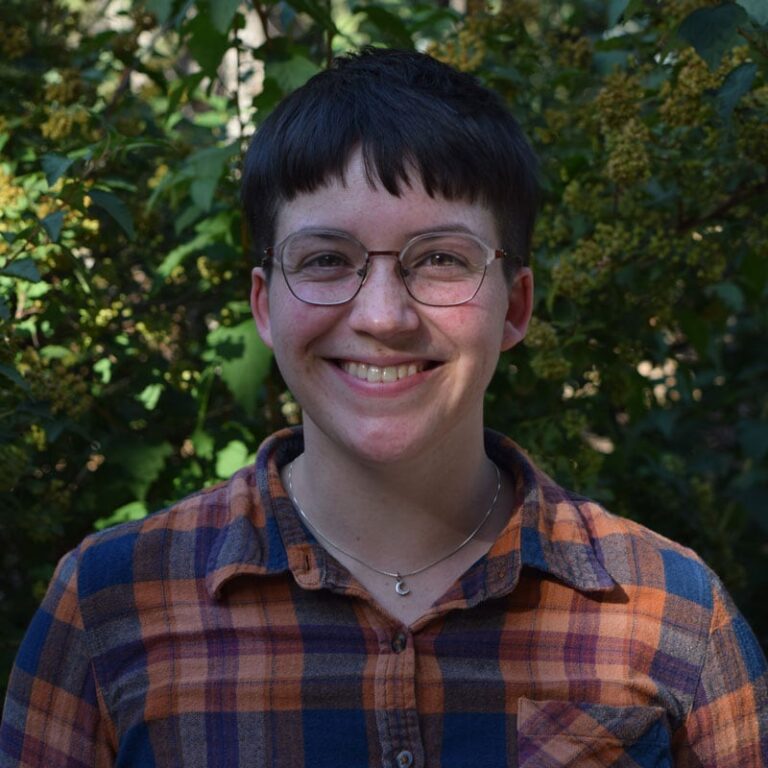 Edmonton Healing Centre developer portrait with greenery background.